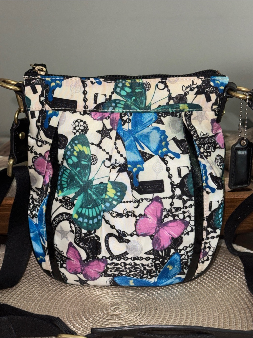 Coach Butterfly Print Crossbody Bag in Blue, Pink, Green on Cream
